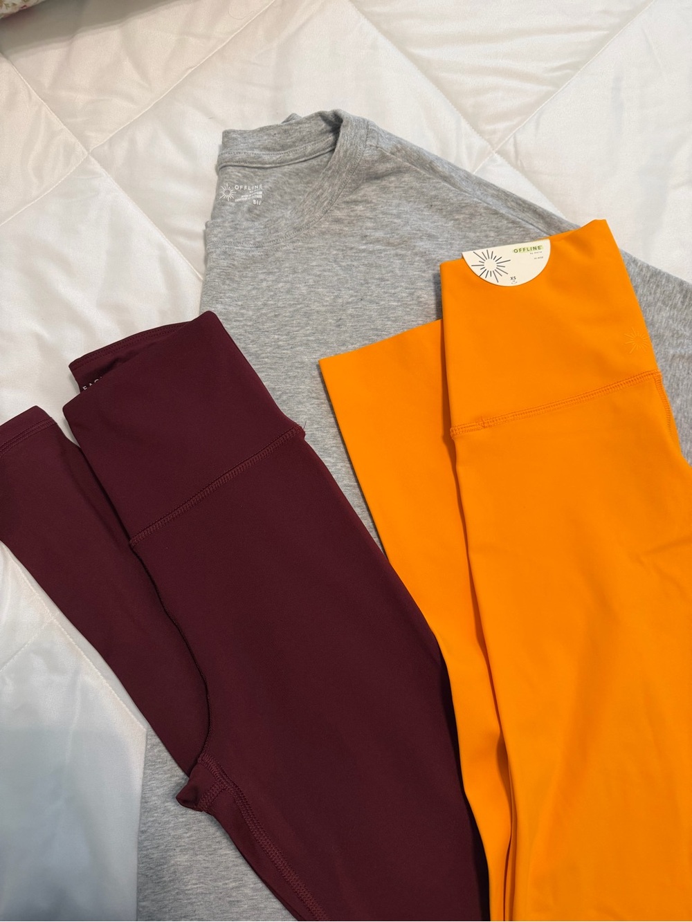 Three Aerie/Offline items. Two leggings and one shirt.